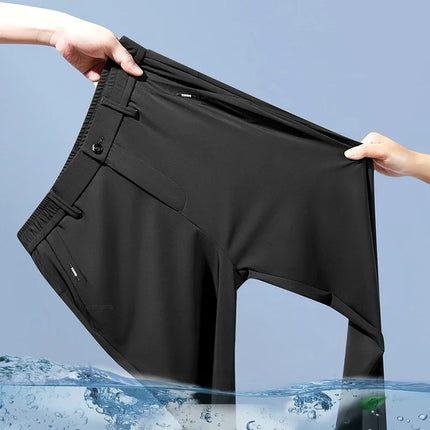 CN Guangdong Men Elastic Quick Dry Ice Silk Trousers by zapcart