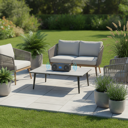 Black S18 portable speaker on British patio